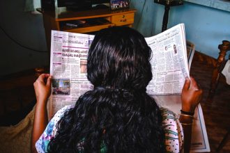 Reading Newspaper.jpg