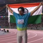 Neeraj Chopra With Indian Flag.jpg