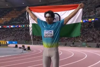 Neeraj Chopra With Indian Flag.jpg
