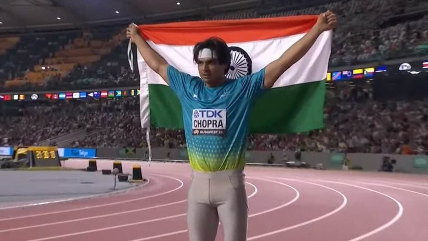 Neeraj Chopra With Indian Flag.jpg