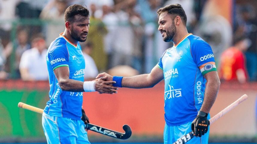 India Mens Hockey Captain Harmanpreet Singh Celebrates A Goal With Teammate.jpg