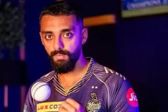 Varun Chakaravarthy In Kkr Jersey.jpg