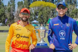 Zimbabwe Captain Sikandar Raza Left And Namibia Skipper Gerhard Erasmus Right.jpg