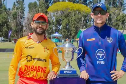 Zimbabwe Captain Sikandar Raza Left And Namibia Skipper Gerhard Erasmus Right.jpg